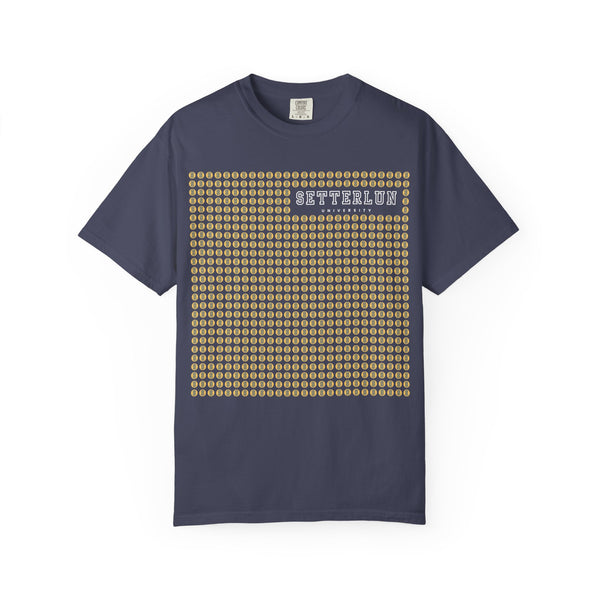 Denim blue t-shirt with a yellow geometric pattern and text on a white background